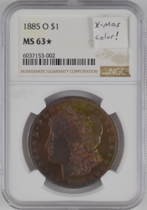 1885-O U.S. $1 - Morgan Silver Dollar - NGC MS63* (Xmas Toning)